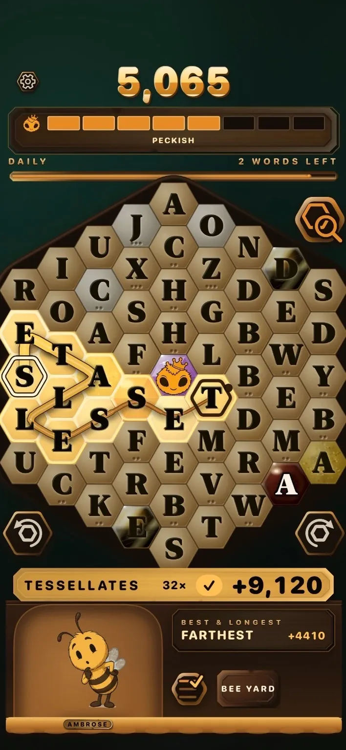 A Waggle board mid-game: TESSELLATES traced across the comb for +9,120 points, with Ambrose below